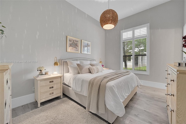 bedroom featuring light wood-type flooring