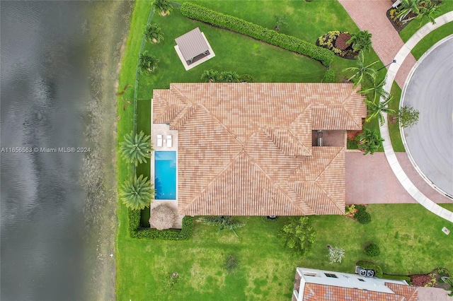 bird's eye view with a water view