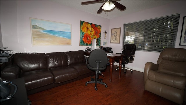 office area featuring dark hardwood / wood-style floors and ceiling fan