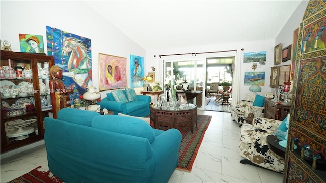 living room featuring lofted ceiling