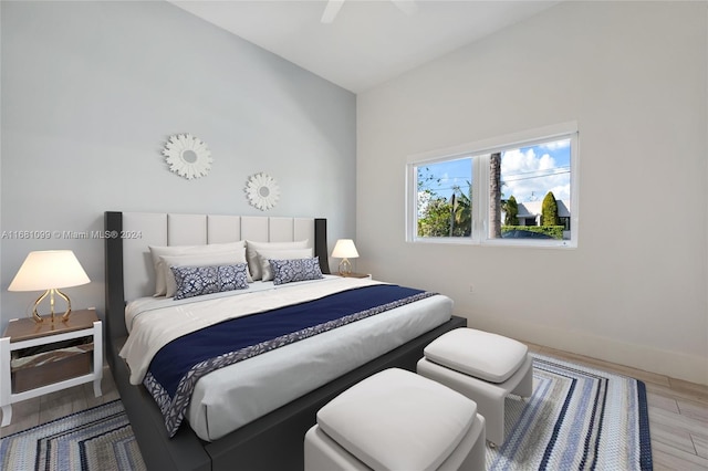 bedroom featuring wood-type flooring and ceiling fan