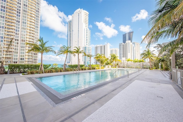 view of swimming pool featuring a patio