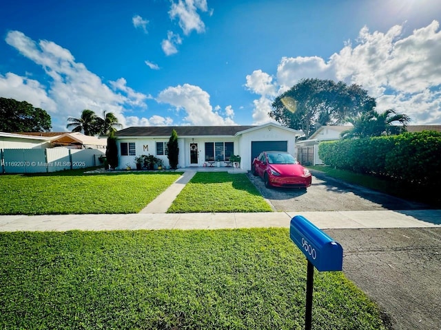 ranch-style home featuring a front yard and a garage