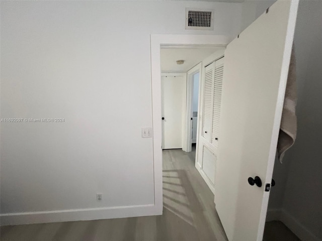 hallway featuring hardwood / wood-style floors