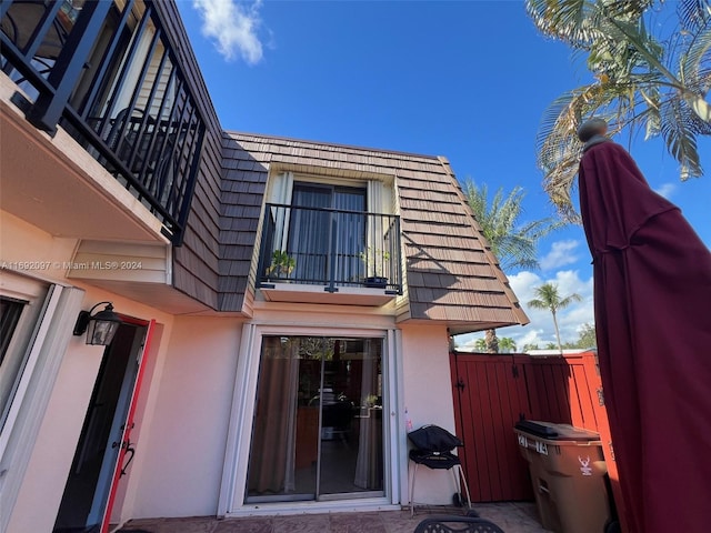 exterior space featuring a balcony