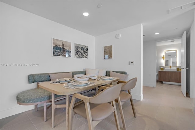 dining room featuring light tile patterned flooring