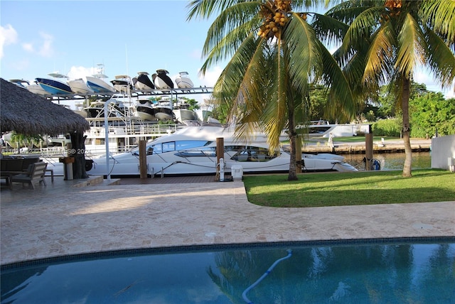 exterior space with a yard and a water view