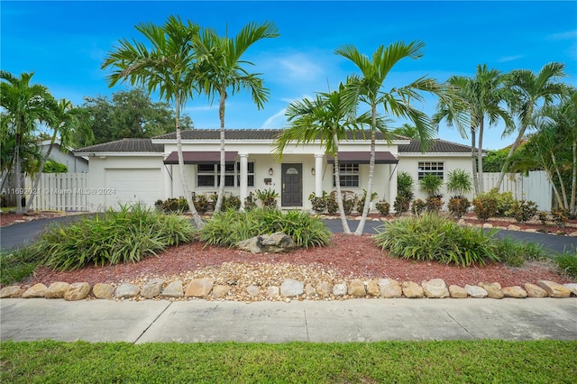 view of front of property featuring a garage