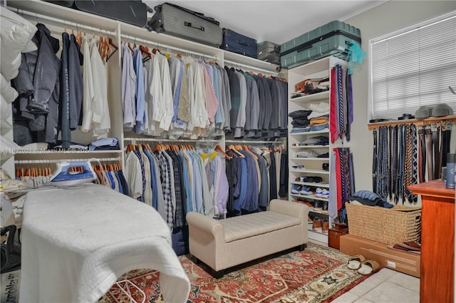 walk in closet featuring light tile patterned floors