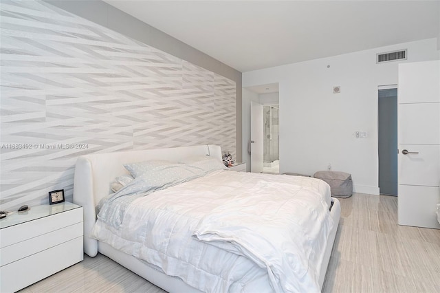 bedroom featuring light hardwood / wood-style flooring