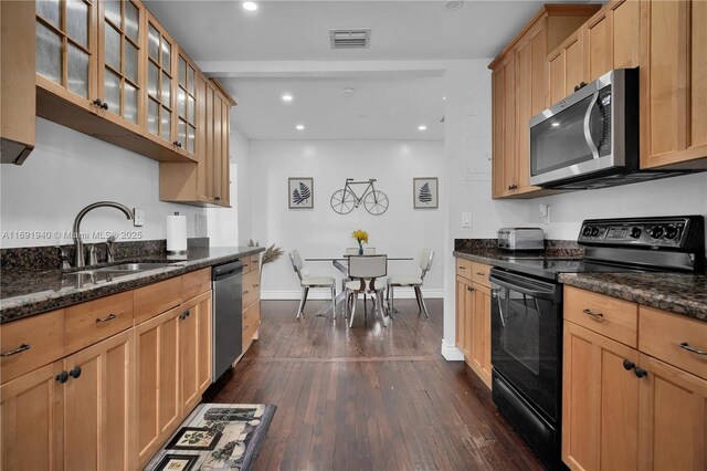 bathroom with walk in shower, toilet, vanity, and hardwood / wood-style flooring