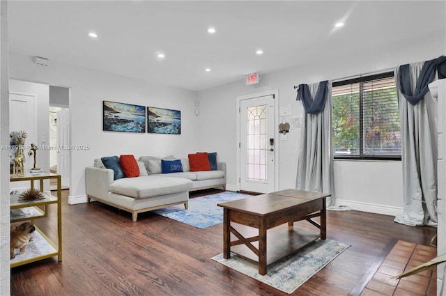 living room with dark hardwood / wood-style floors