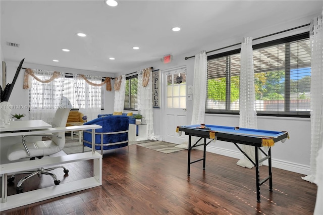 rec room with dark wood-type flooring, billiards, and a healthy amount of sunlight