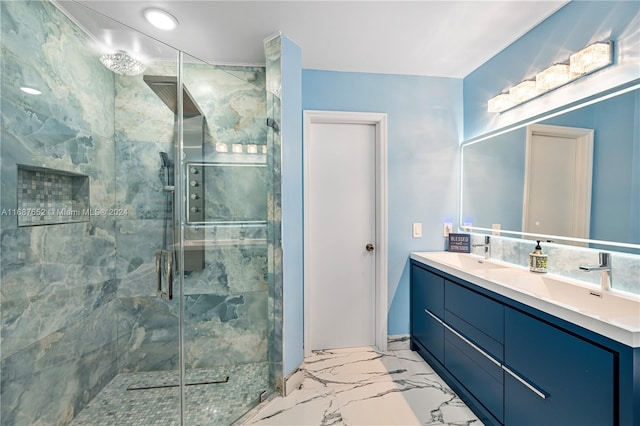 bathroom with vanity and an enclosed shower