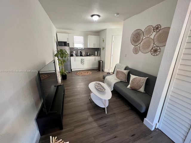 living room with dark wood-type flooring