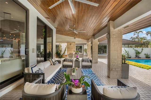 view of patio with ceiling fan and an outdoor hangout area