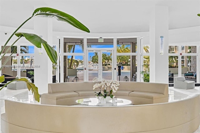 living room with french doors and plenty of natural light