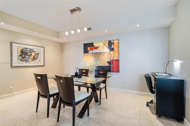 dining area featuring light tile patterned flooring