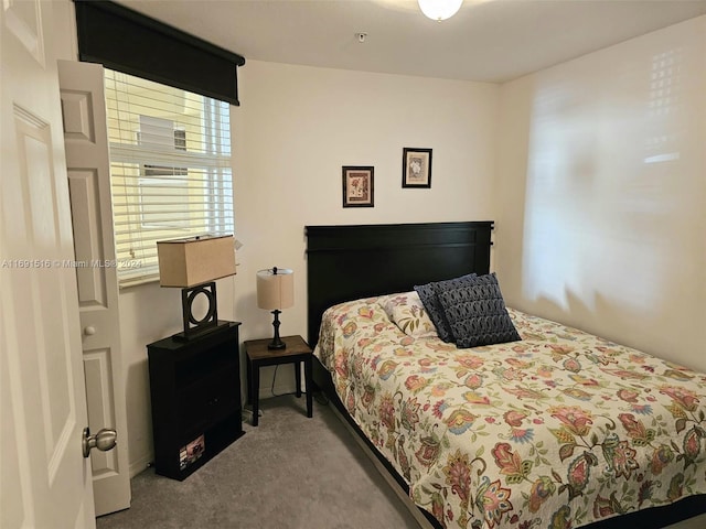 bedroom with light colored carpet