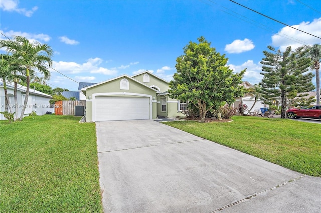 view of front facade with a garage and a front yard