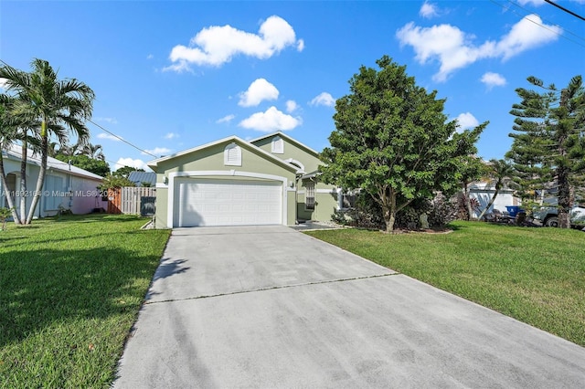 view of front of house with a garage and a front lawn