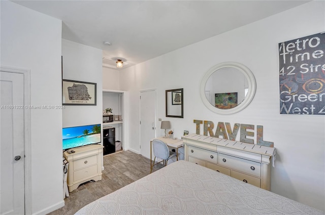 bedroom with light hardwood / wood-style flooring