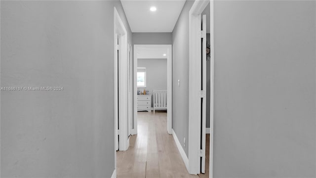 hallway featuring light hardwood / wood-style floors