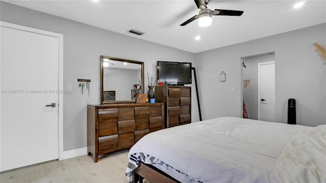 bedroom featuring ceiling fan and light hardwood / wood-style floors