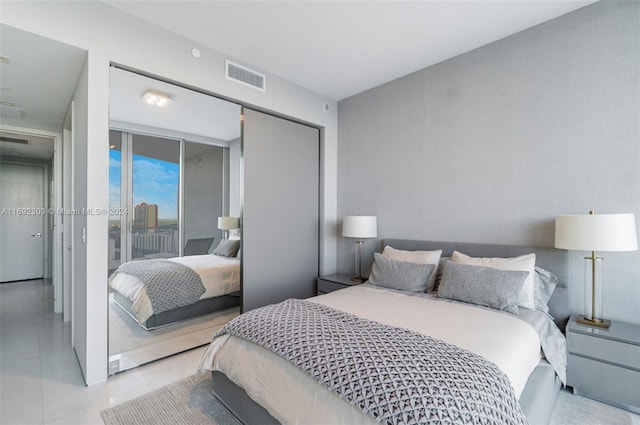 16901 Collins Ave Unit 1503, Sunny Isles Beach, FL 33160 - bedroom featuring tile patterned flooring and access to exterior
