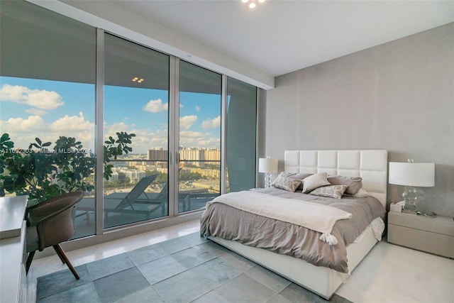16901 Collins Ave Unit 1503, Sunny Isles Beach, FL 33160 - bedroom featuring floor to ceiling windows, access to exterior, and tile patterned floors