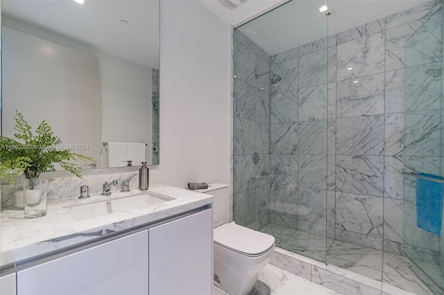 16901 Collins Ave Unit 1503, Sunny Isles Beach, FL 33160 - bathroom featuring toilet, a tile shower, vanity, and marble finish flooring