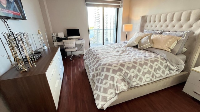 bedroom featuring dark hardwood / wood-style flooring