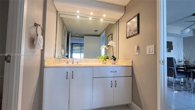 bathroom featuring vanity and tile patterned floors