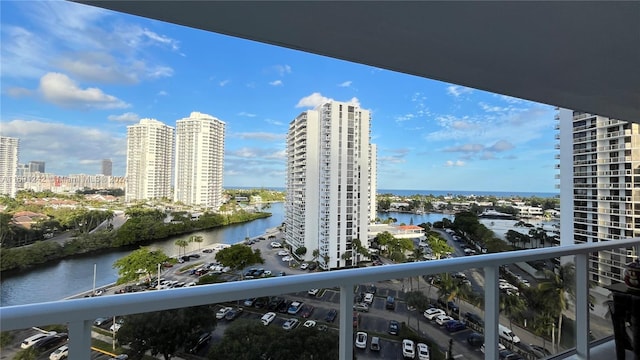 balcony featuring a water view