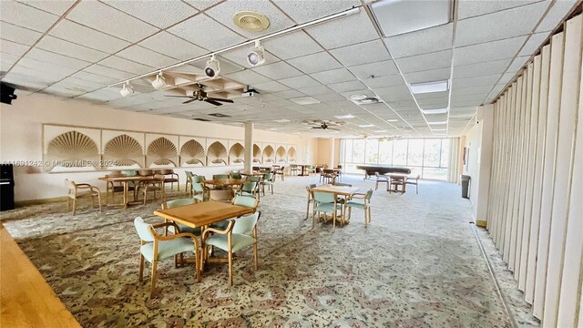 3731 N Country Club Dr Unit 1121, Aventura, FL 33180 - dining room featuring ceiling fan, billiards table, and a drop ceiling