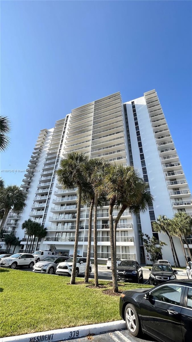 3731 N Country Club Dr Unit 1121, Aventura, FL 33180 - view of apartment building / complex featuring uncovered parking