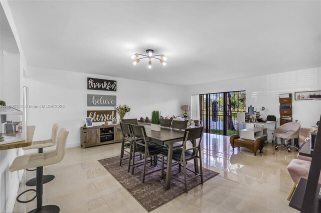 dining room with a chandelier