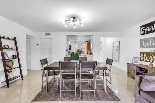 dining room featuring an inviting chandelier