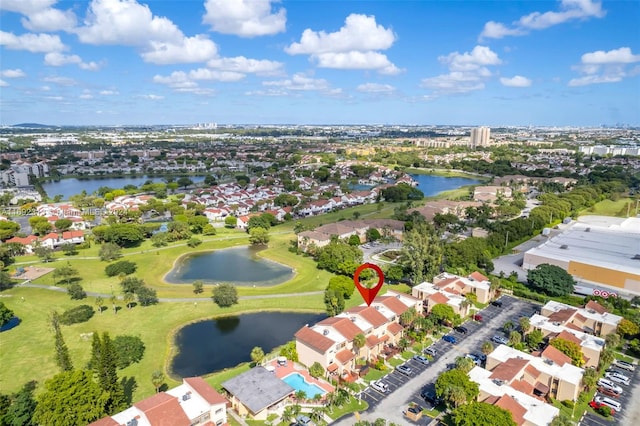 drone / aerial view with a water view