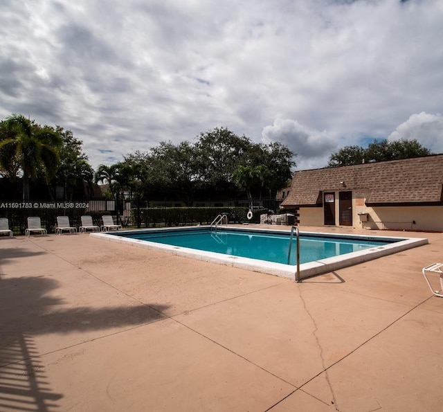 view of pool with a patio area