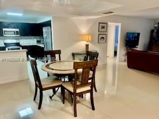 dining room featuring tile patterned floors