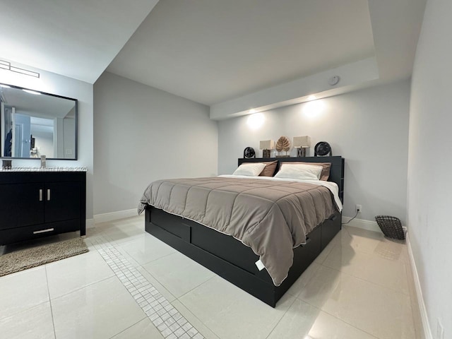 bedroom with light tile patterned flooring