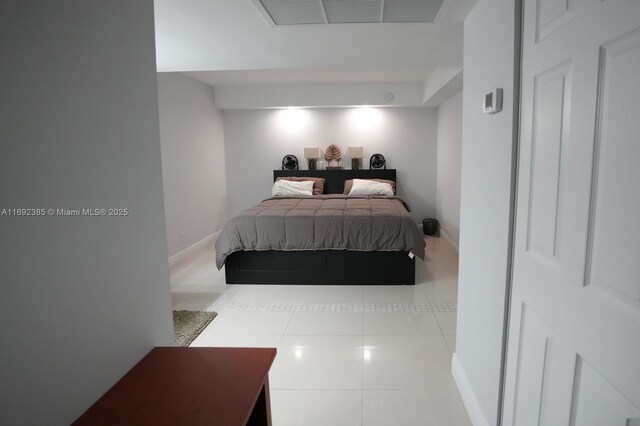 209 N Fort Lauderdale Beach Blvd Unit 7D, Fort Lauderdale, FL 33304 - bedroom featuring baseboards and tile patterned flooring