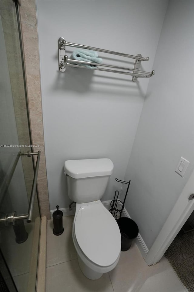 209 N Fort Lauderdale Beach Blvd Unit 7D, Fort Lauderdale, FL 33304 - bathroom with toilet and tile patterned flooring
