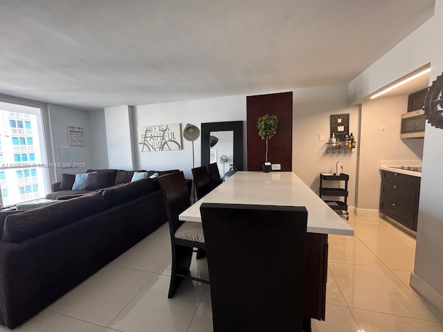 dining room with light tile patterned floors