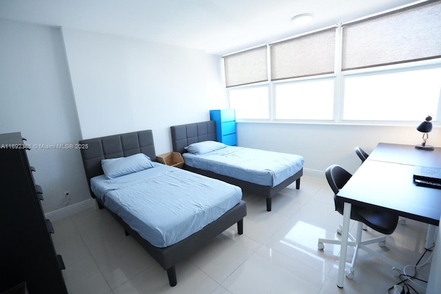 209 N Fort Lauderdale Beach Blvd Unit 7D, Fort Lauderdale, FL 33304 - bedroom featuring baseboards