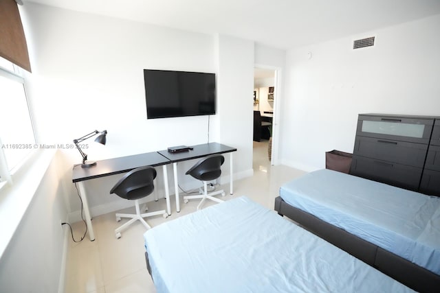 209 N Fort Lauderdale Beach Blvd Unit 7D, Fort Lauderdale, FL 33304 - bedroom featuring baseboards and an office area