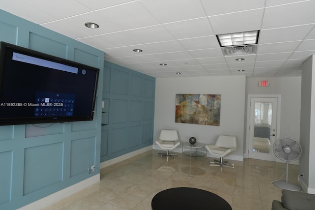 209 N Fort Lauderdale Beach Blvd Unit 7D, Fort Lauderdale, FL 33304 - building lobby with a decorative wall, a drop ceiling, and recessed lighting