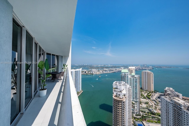 balcony featuring a water view