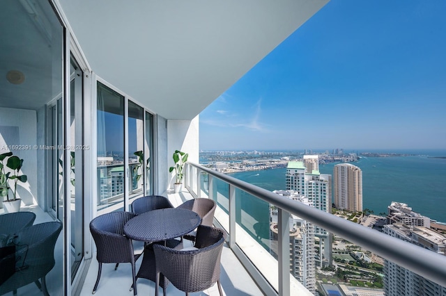 465 E Brickell Ave Unit 5305, Miami, FL 33131 - balcony featuring a water view and a city view
